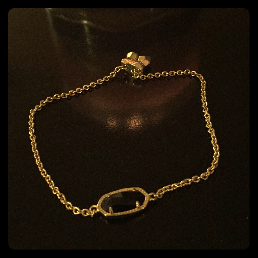 Kendra Scott black and gold bracelet.
